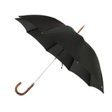 Handcrafted classic umbrella with green canopy, brass shaft, and bamboo wood handle – made in Italy, entirely plastic-free